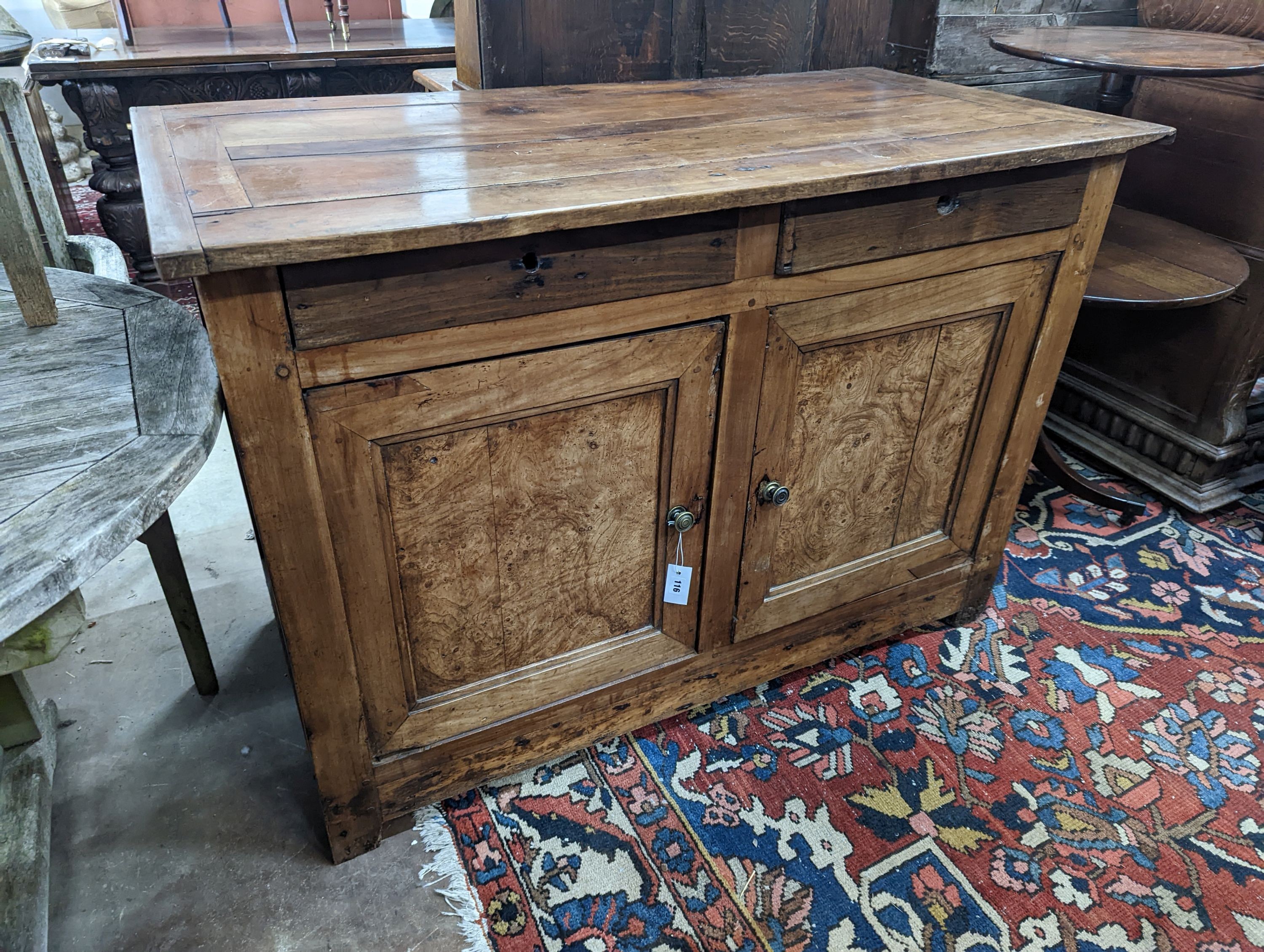 A late 18th / early 19th century French walnut and fruitwood side cabinet, width 130cm, depth 65cm, height 92cm